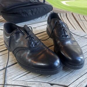 Golf shoes and shoe bag.